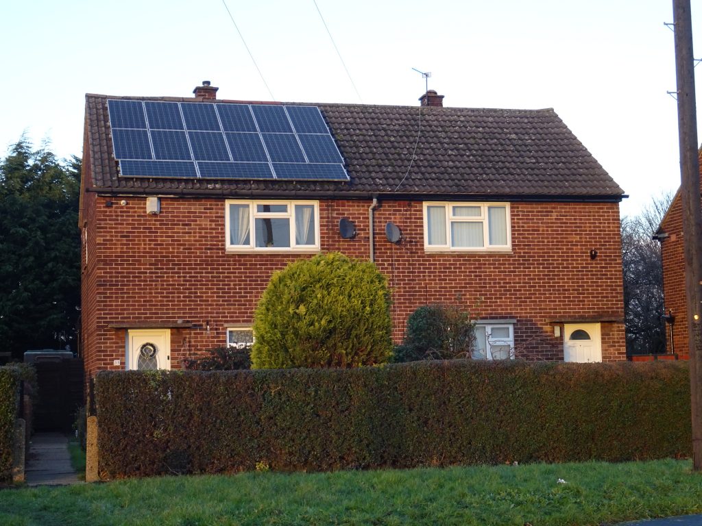 Photograph of house with photovoltaic panels